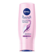 Ošetrujúci kondicionér s mliečnymi a hodvábnymi proteínmi na unavené vlasy bez lesku Hair milk Shine ( Care Conditioner) 200 ml